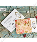 <p>Invitație de nuntă cu un bogat ornament floristic, confecționată din două elemente: cartonașul destinat printării textului și teaca cu rol de plic. Invitația nu conține plic adițional.</p>